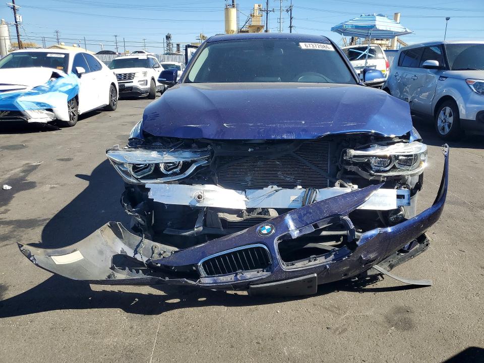 67372086 :رقم المزاد ، WBA8E1G58JNU91978 vin ، 2018 Bmw 320 مزاد بيع