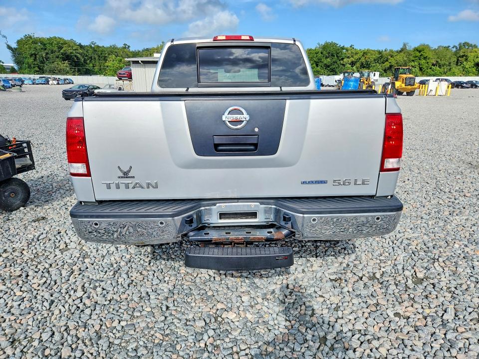 69103206 :رقم المزاد ، 1N6BA0EC0AN310286 vin ، 2010 Nissan Titan مزاد بيع