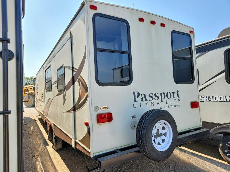 68749746 :رقم المزاد ، 4YDT31825DT411041 vin ، 2013 Keystone Passport مزاد بيع