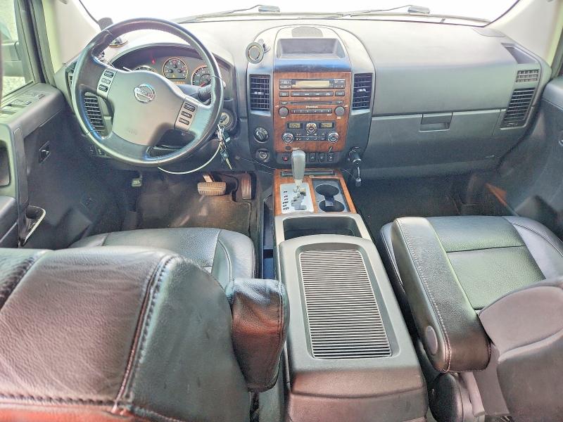 69103206 :رقم المزاد ، 1N6BA0EC0AN310286 vin ، 2010 Nissan Titan مزاد بيع