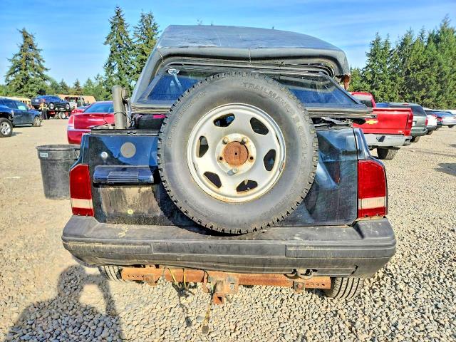 1993 Geo Tracker მანქანა იყიდება აუქციონზე, vin: 2CNBJ18UXP6935073, აუქციონის ნომერი: 69959236
