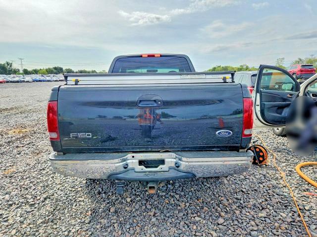 68799006 :رقم المزاد ، 1FTRX17W31KF03207 vin ، 2001 Ford F150 مزاد بيع