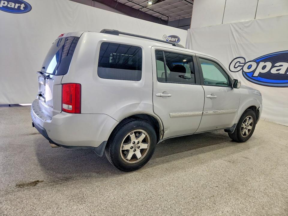 69718496 :رقم المزاد ، 5FNYF3H94BB045064 vin ، 2011 Honda Pilot مزاد بيع
