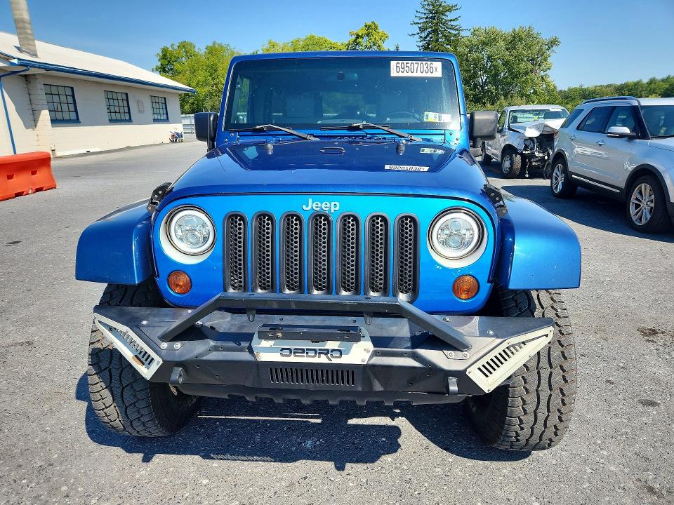 69507036 :رقم المزاد ، 1J8GA591X9L735979 vin ، 2009 Jeep Wrangler Unlimited مزاد بيع