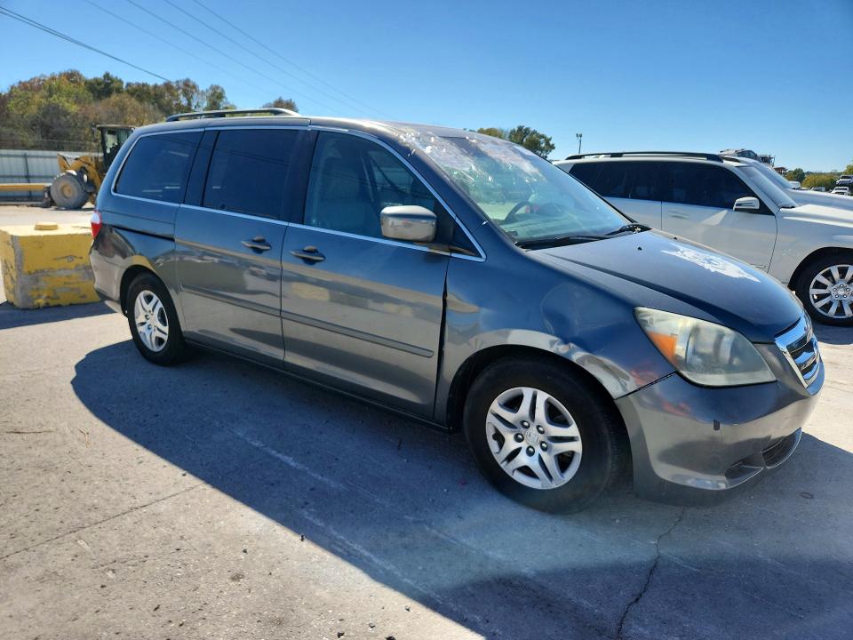 70997306 :رقم المزاد ، 5FNRL38747B456628 vin ، 2007 Honda Odyssey مزاد بيع
