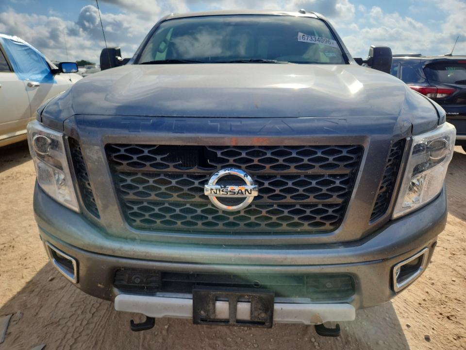67334096 :رقم المزاد ، 1N6AA1F49JN521429 vin ، 2018 Nissan Titan Xd مزاد بيع