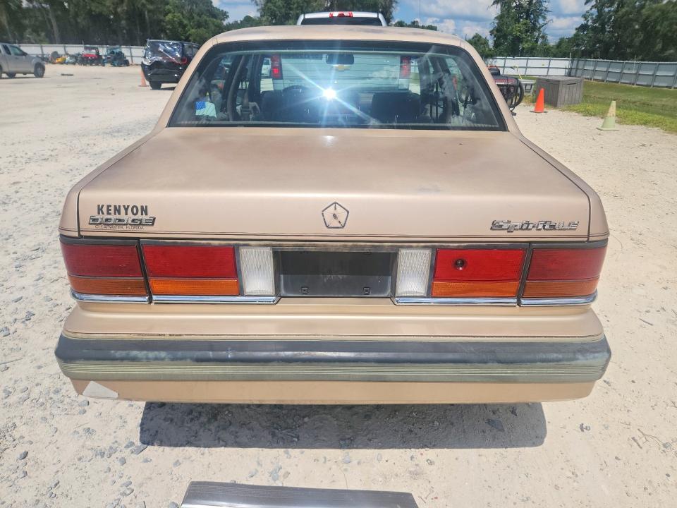 69419596 :رقم المزاد ، 1B3BA56J9KF464277 vin ، 1989 Dodge Spirit مزاد بيع