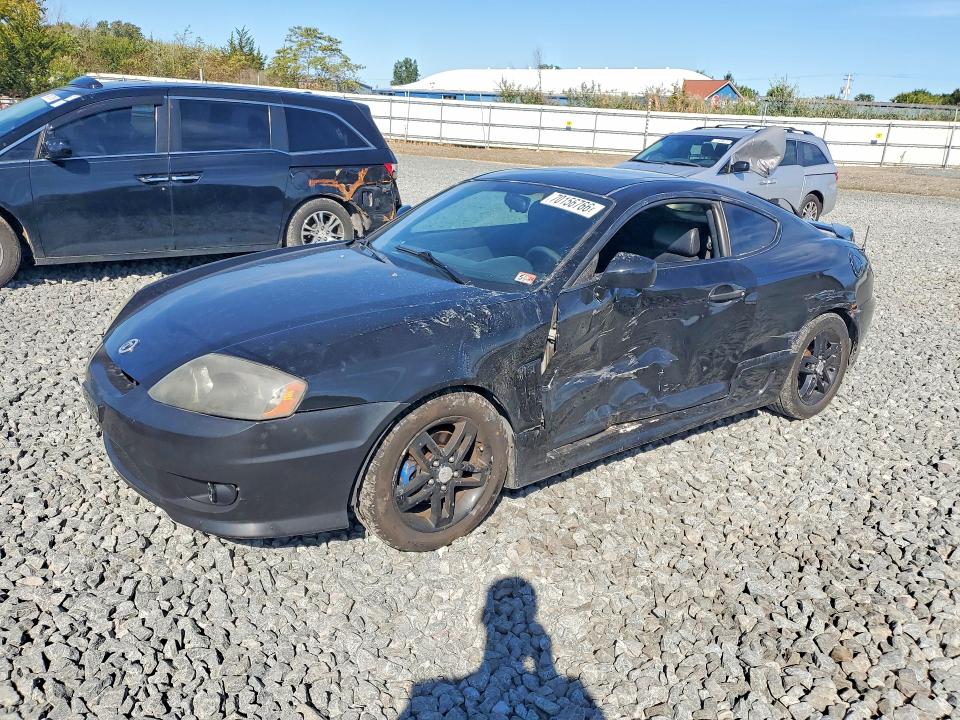 2003 Hyundai Tiburon მანქანა იყიდება აუქციონზე, vin: KMHHN65F33U018652, აუქციონის ნომერი: 70156766