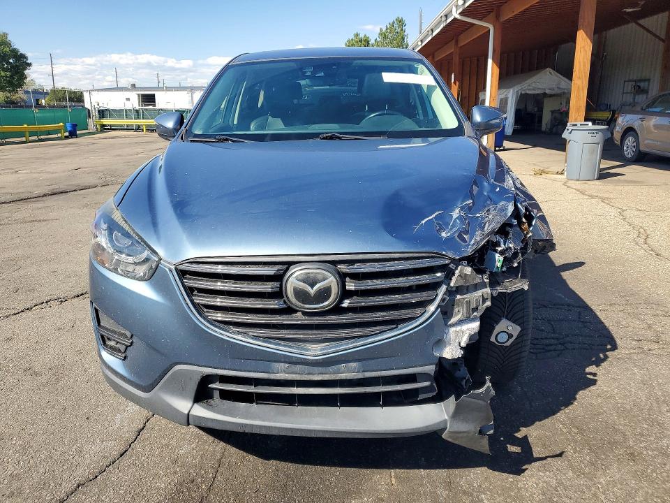 2016 Mazda Cx5 მანქანა იყიდება აუქციონზე, vin: JM3KE4DY4G0871373, აუქციონის ნომერი: 69909336