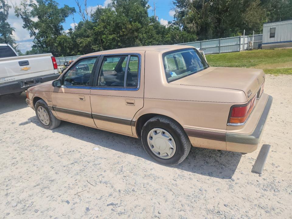 69419596 :رقم المزاد ، 1B3BA56J9KF464277 vin ، 1989 Dodge Spirit مزاد بيع