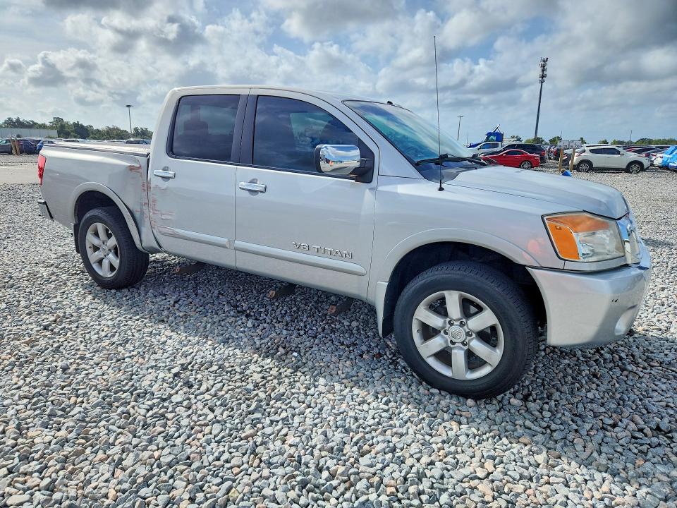 69103206 :رقم المزاد ، 1N6BA0EC0AN310286 vin ، 2010 Nissan Titan مزاد بيع