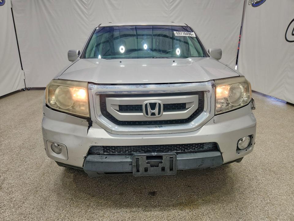 69718496 :رقم المزاد ، 5FNYF3H94BB045064 vin ، 2011 Honda Pilot مزاد بيع
