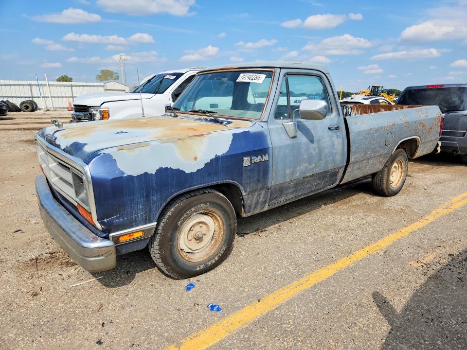 70240286 :رقم المزاد ، 1B7FE06Y0KS062837 vin ، 1989 Dodge D-series مزاد بيع