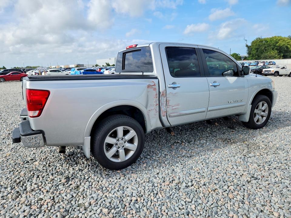 69103206 :رقم المزاد ، 1N6BA0EC0AN310286 vin ، 2010 Nissan Titan مزاد بيع