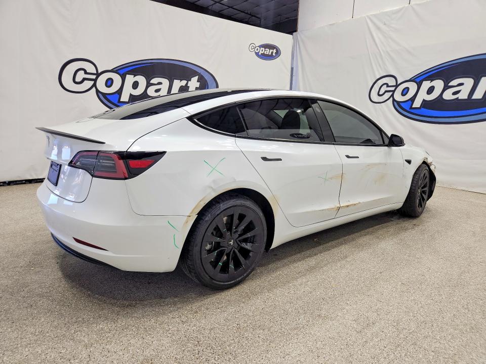Продажа на аукционе авто 2023 Tesla Model 3, vin: 5YJ3E1EA3PF642164, номер лота: 67354286