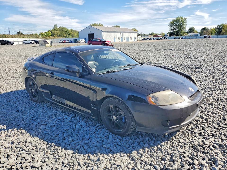 2003 Hyundai Tiburon მანქანა იყიდება აუქციონზე, vin: KMHHN65F33U018652, აუქციონის ნომერი: 70156766
