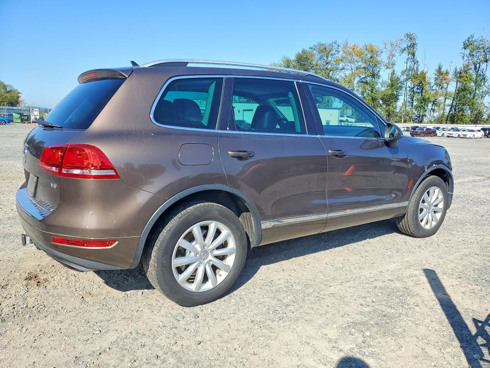 Auction sale of the 2011 Volkswagen Touareg, vin: WVGFF9BP8BD000634, lot number: 69319026