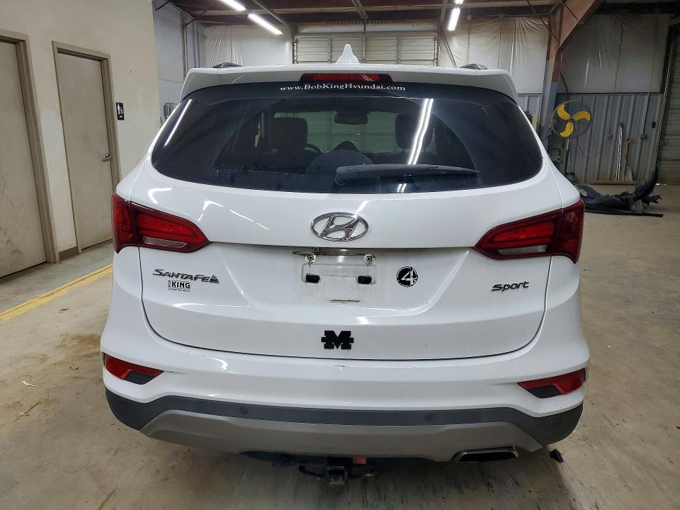 69015296 :رقم المزاد ، 5NMZU3LB8JH069952 vin ، 2018 Hyundai Santa Fe Sport مزاد بيع