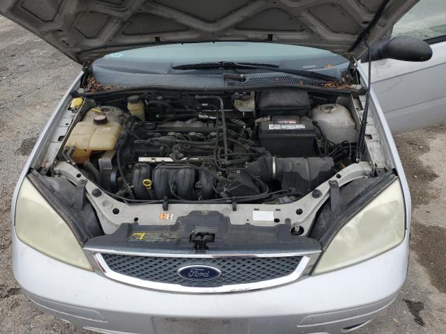 86604005 :رقم المزاد ، 1FAFP34N25W202670 vin ، 2005 Ford Focus مزاد بيع