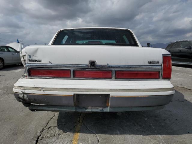 1997 Lincoln Townhouse Town Car მანქანა იყიდება აუქციონზე, vin: 1LNLM82W7VY644875, აუქციონის ნომერი: 82307035