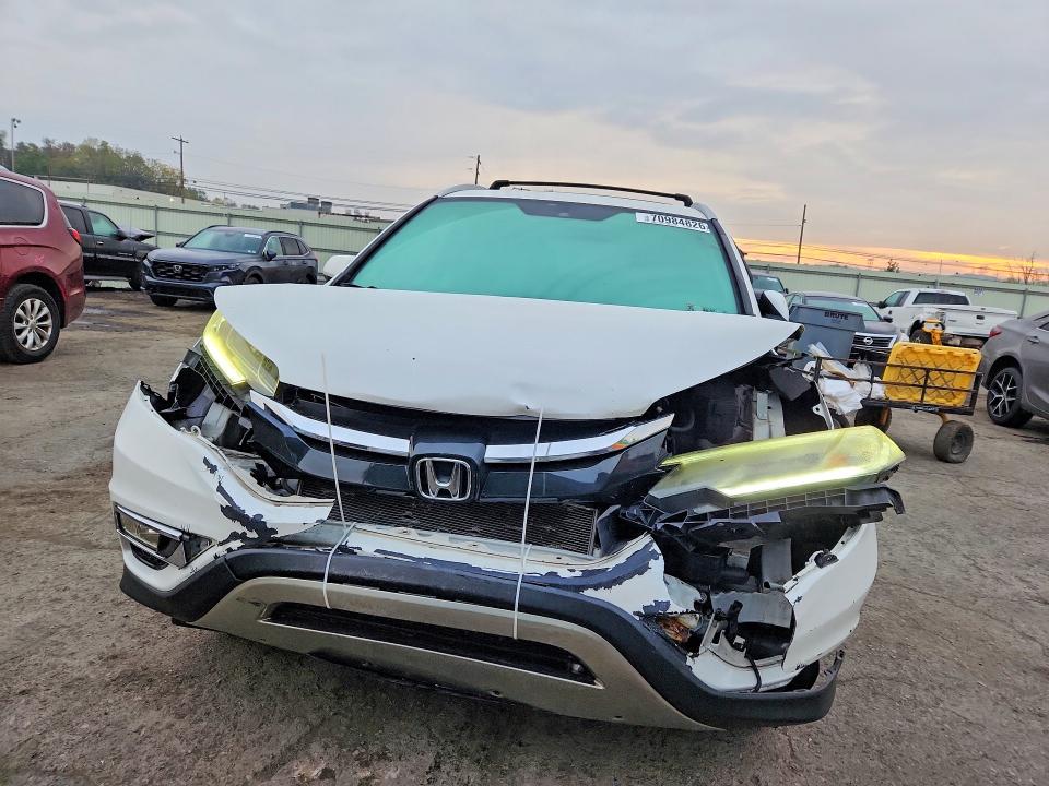 70984826 :رقم المزاد ، 5J6RM4H72GL046453 vin ، 2016 Honda Cr-v مزاد بيع