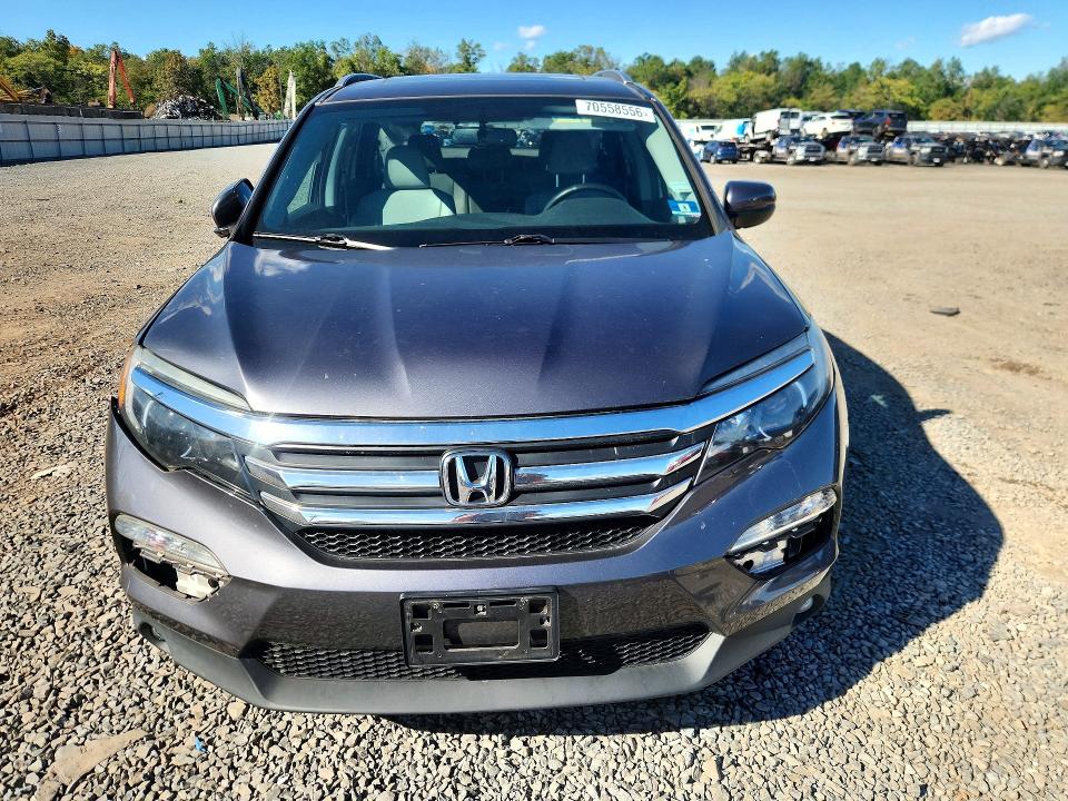 70558556 :رقم المزاد ، 5FNYF6H74JB070786 vin ، 2018 Honda Pilot مزاد بيع