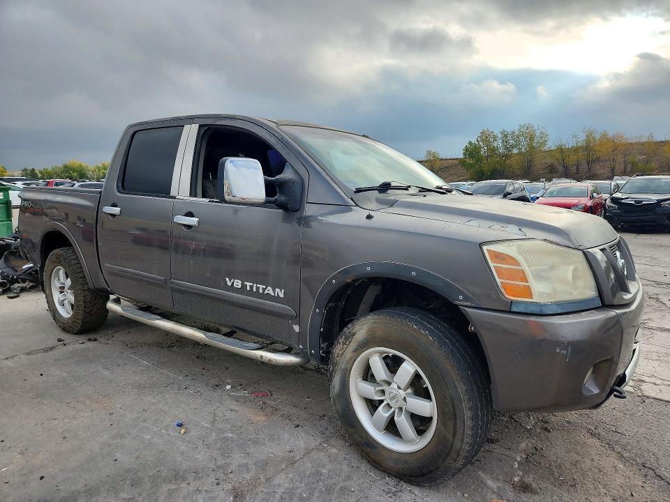 70521716 :رقم المزاد ، 1N6AA0ECXBN317596 vin ، 2011 Nissan Titan مزاد بيع