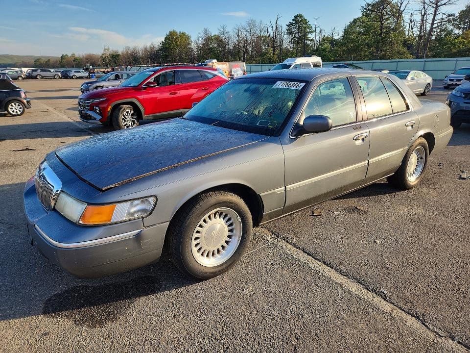 71286966 :رقم المزاد ، 2MEFM75W4XX702448 vin ، 1999 Mercury Grand Marquis مزاد بيع