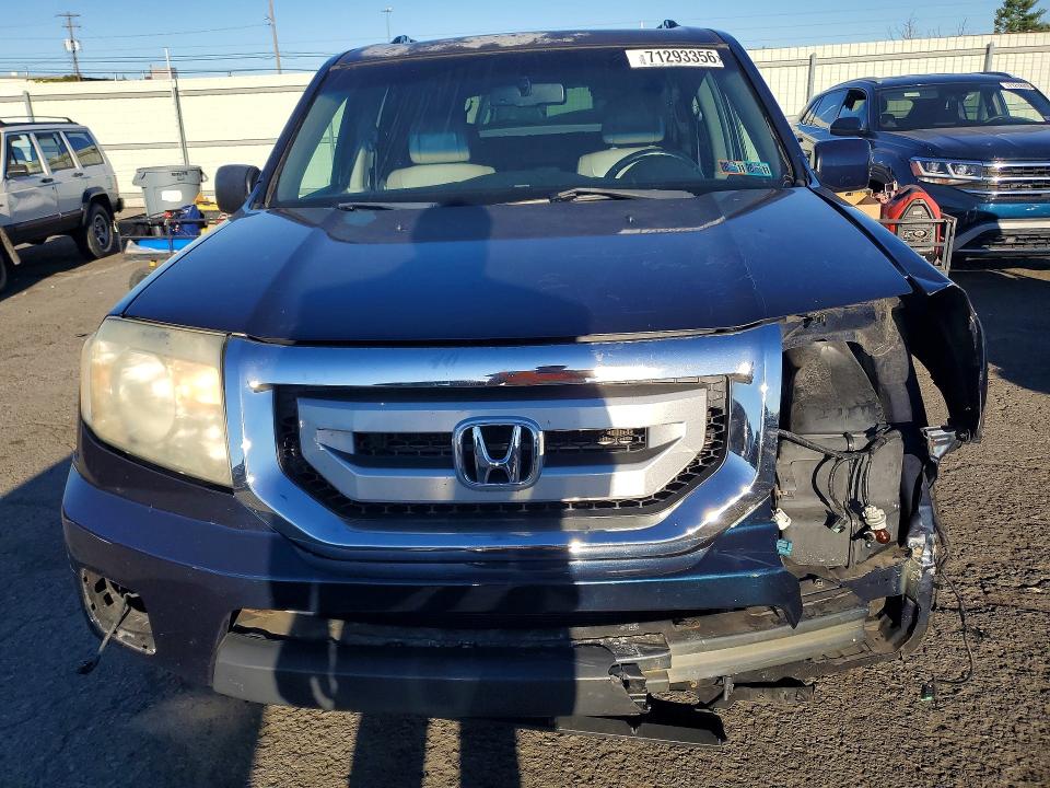 71293356 :رقم المزاد ، 5FNYF4H50BB090036 vin ، 2011 Honda Pilot مزاد بيع