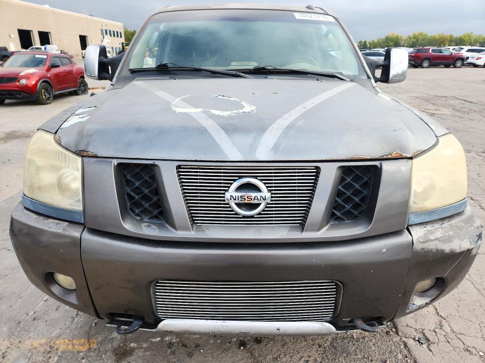 70521716 :رقم المزاد ، 1N6AA0ECXBN317596 vin ، 2011 Nissan Titan مزاد بيع