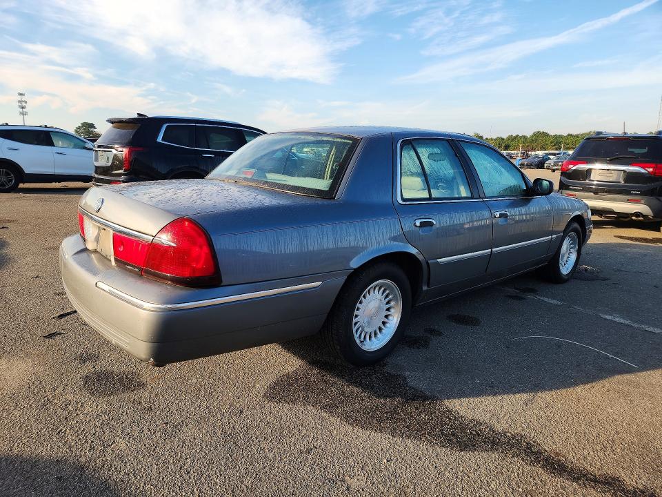71286966 :رقم المزاد ، 2MEFM75W4XX702448 vin ، 1999 Mercury Grand Marquis مزاد بيع