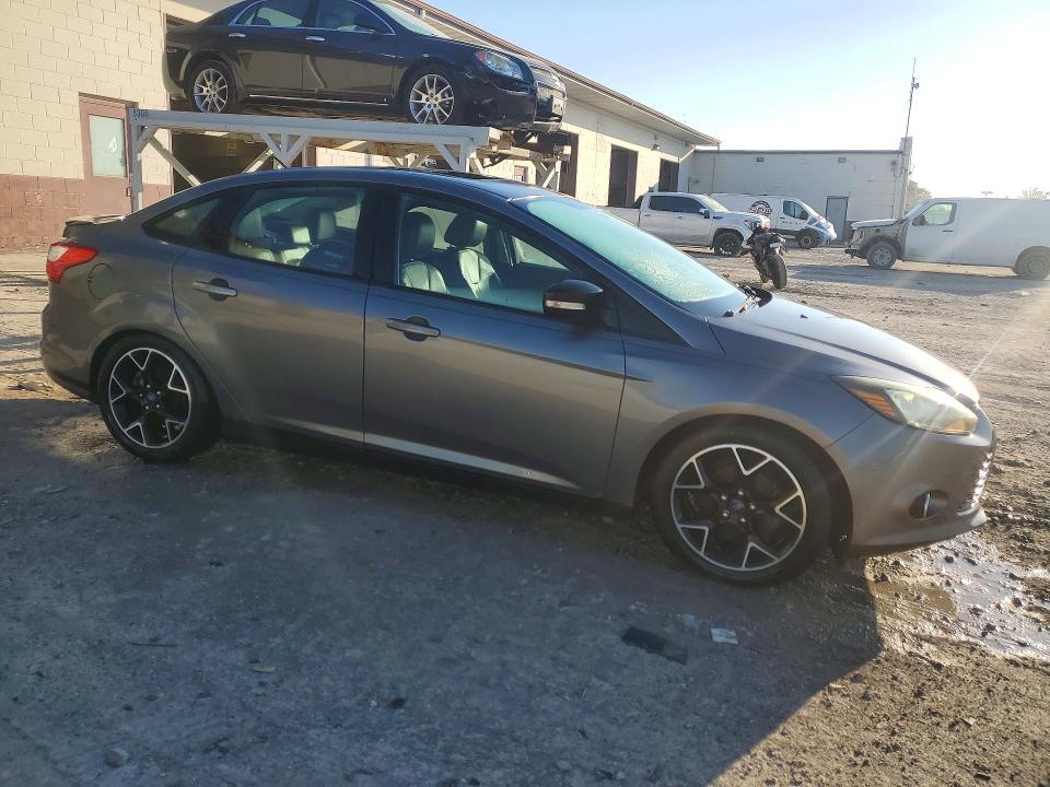 Auction sale of the 2014 Ford Focus, vin: 1FADP3F20EL129231, lot number: 70924176
