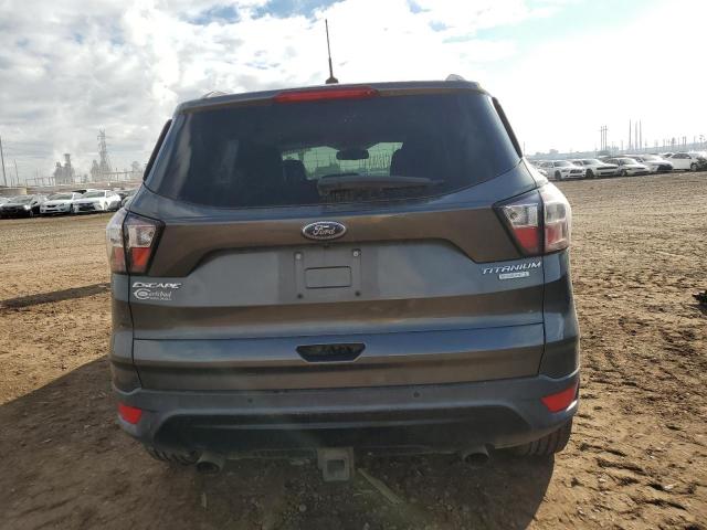 2017 Ford Escape Titanium მანქანა იყიდება აუქციონზე, vin: 1FMCU0J9XHUD19940, აუქციონის ნომერი: 76946863