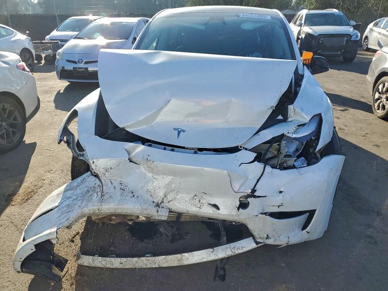 2025 Tesla Model Y მანქანა იყიდება აუქციონზე, vin: 7SAYGDEFXSF299877, აუქციონის ნომერი: 94251095