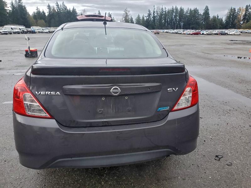 94535075 :رقم المزاد ، 3N1CN7AP1FL911567 vin ، 2015 Nissan Versa مزاد بيع