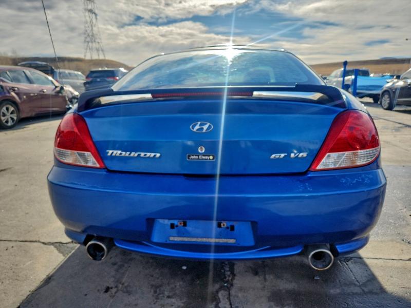 93749235 :رقم المزاد ، KMHHN65F65U167530 vin ، 2005 Hyundai Tiburon مزاد بيع