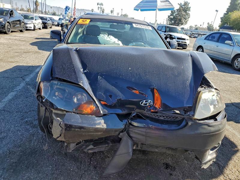 2006 Hyundai Tiburon მანქანა იყიდება აუქციონზე, vin: KMHHN65F56U213981, აუქციონის ნომერი: 94761515