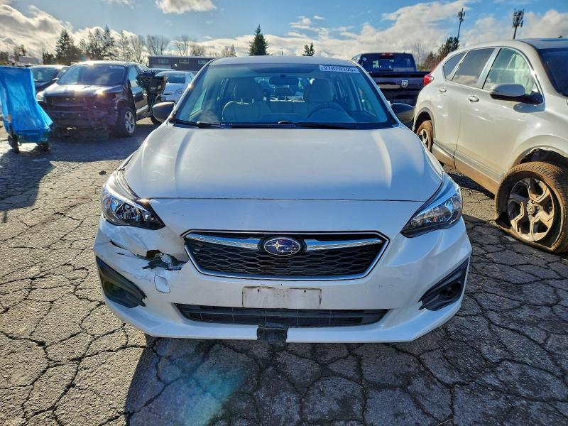 97870105 :رقم المزاد ، 4S3GTAA63J3750958 vin ، 2018 Subaru Impreza مزاد بيع