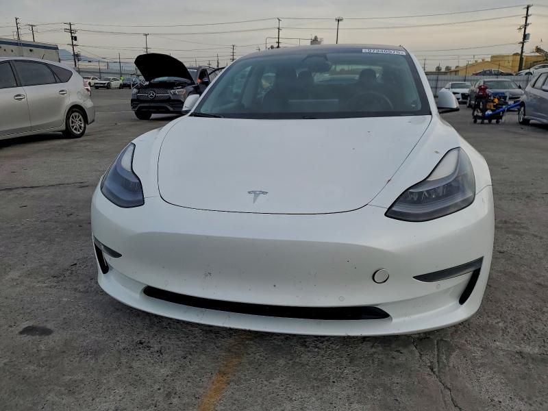 Продажа на аукционе авто 2021 Tesla Model 3, vin: 5YJ3E1EA9MF930749, номер лота: 97340575