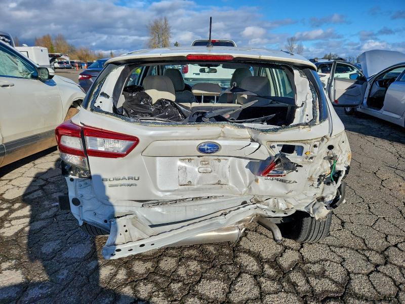 97870105 :رقم المزاد ، 4S3GTAA63J3750958 vin ، 2018 Subaru Impreza مزاد بيع