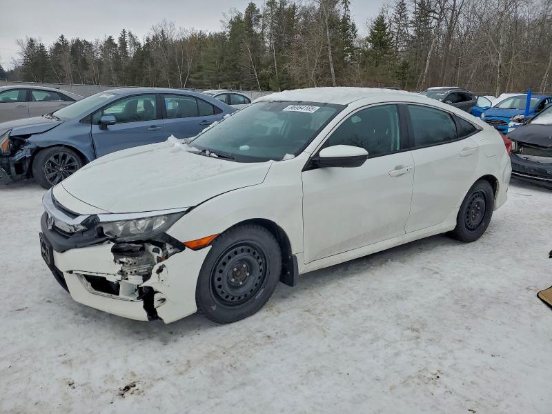 Продажа на аукционе авто 2018 Honda Civic Lx, vin: 2HGFC2F62JH040068, номер лота: 96964165