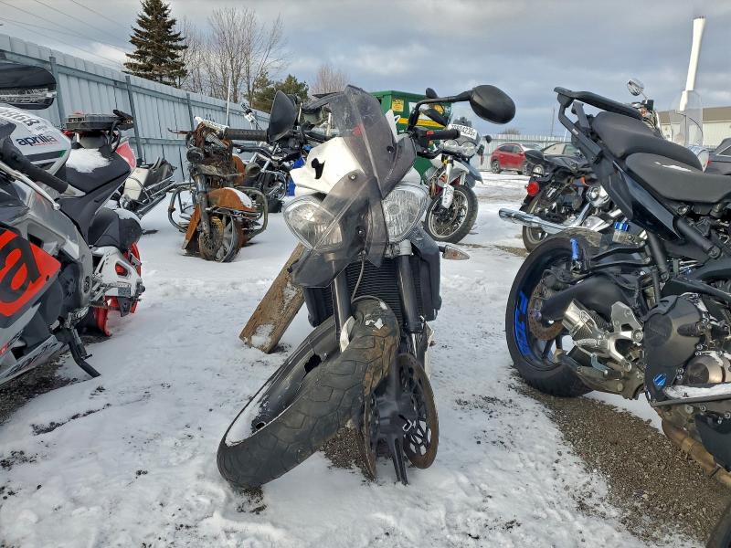Продажа на аукционе авто 2012 Triumph Motorcycle Street Triple, vin: SMTD02NE8CT487860, номер лота: 95281885